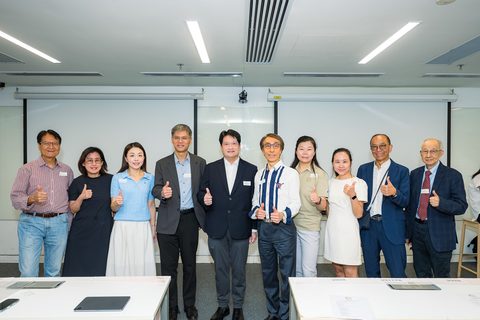 Guests give a thumbs up at the sharing session