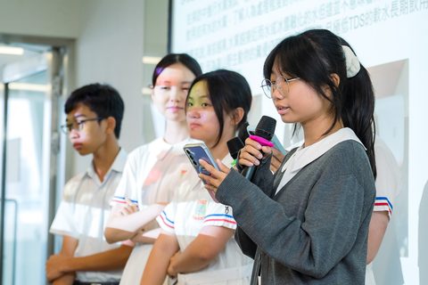 Students share their reflections on stage
